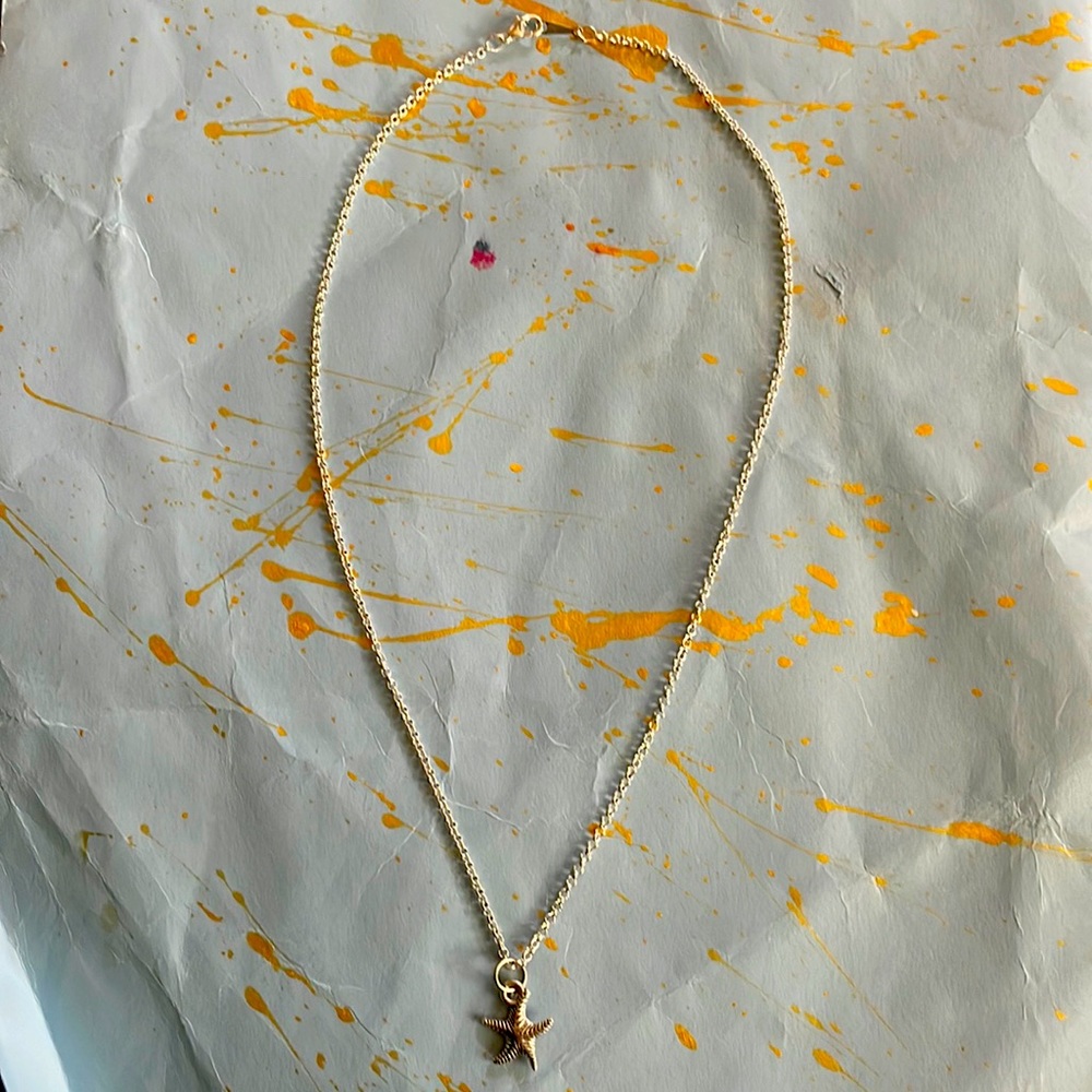 Those is a 12in necklace/choker. It is a siliver seastar necklace